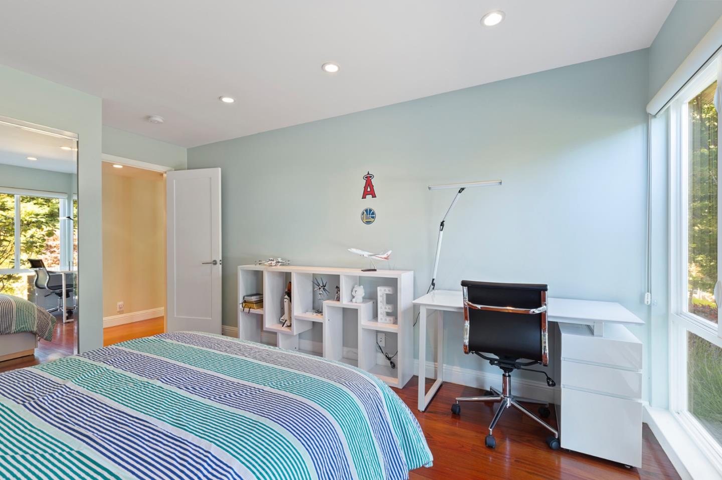 36 Tobin Clark Drive Hillsborough, CA 94010 - Photo 14 of 50 a bedroom with furniture and a window