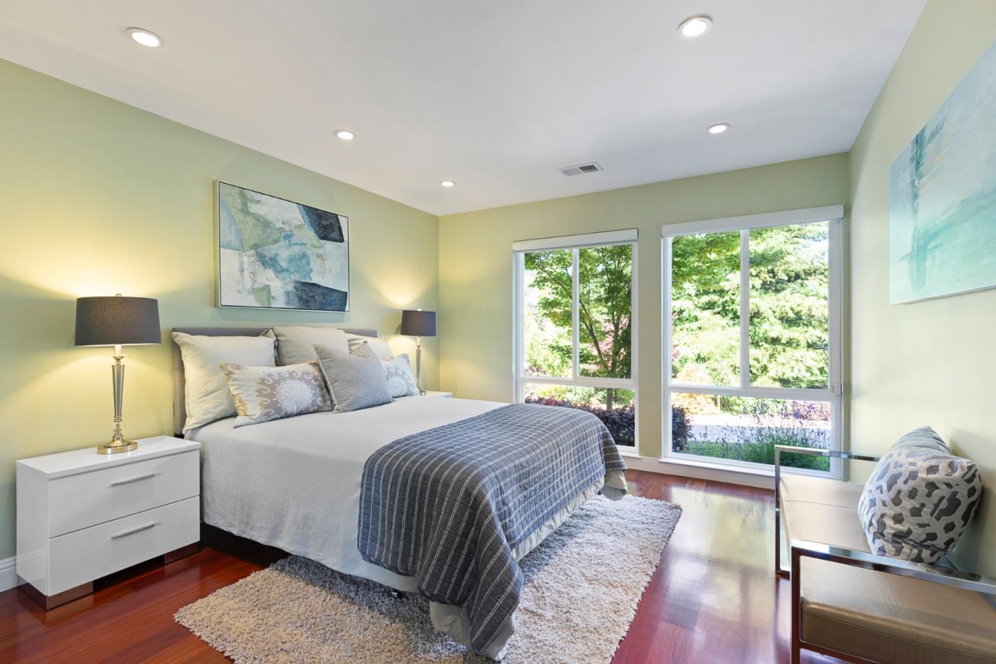 36 Tobin Clark Drive Hillsborough, CA 94010 - Photo 15 of 50 a spacious bedroom with a large bed and a couch