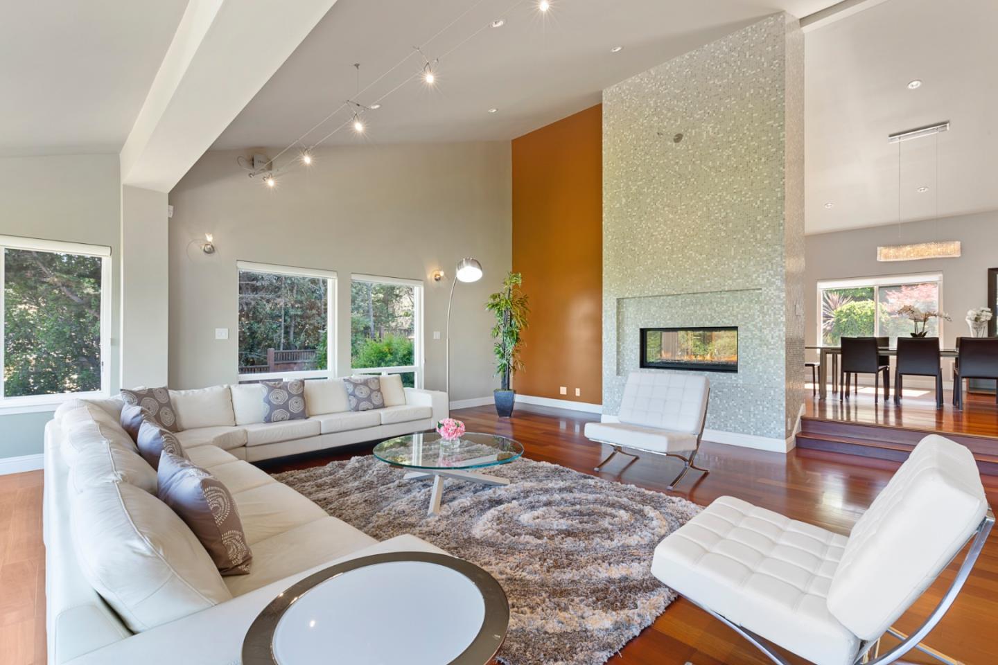 36 Tobin Clark Drive Hillsborough, CA 94010 - Photo 20 of 50 a living room with furniture and a large window