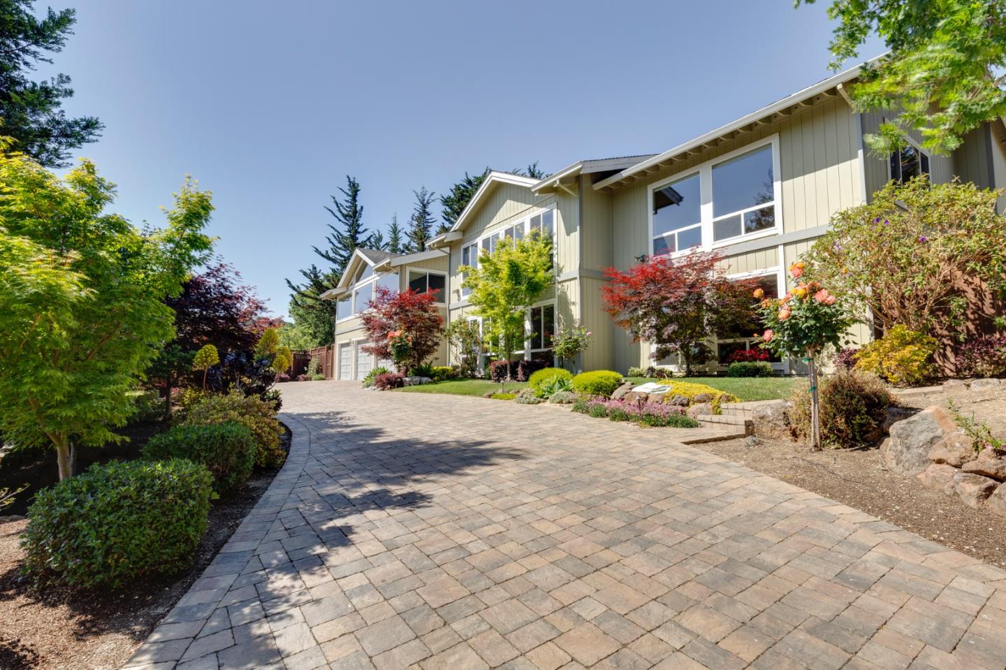 36 Tobin Clark Drive Hillsborough, CA 94010 - Photo 2 of 50 a view of a house with a yard and garden