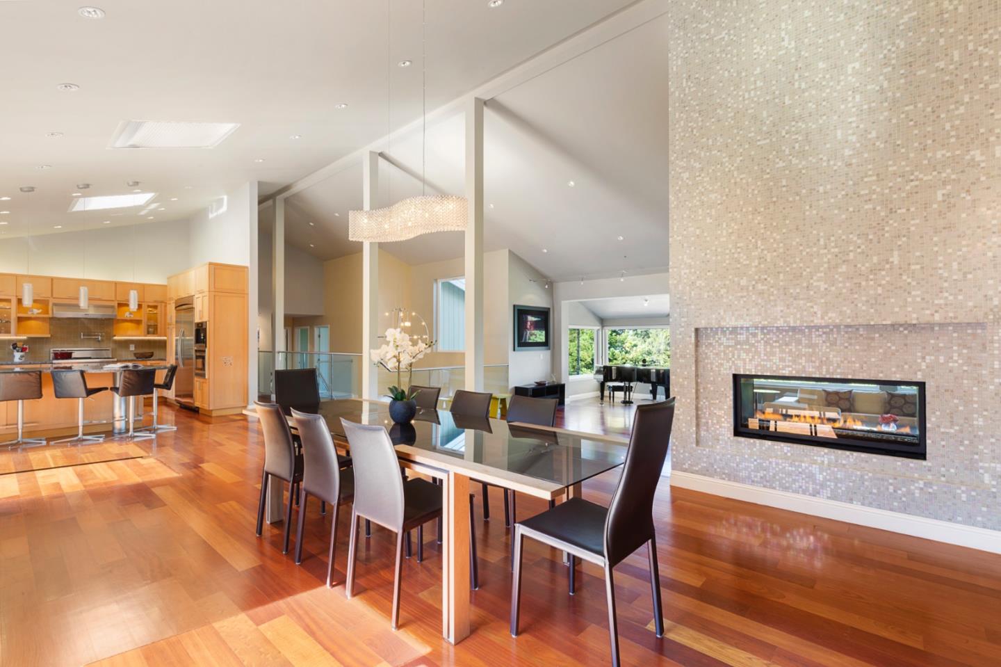 36 Tobin Clark Drive Hillsborough, CA 94010 - Photo 23 of 50 an open kitchen with dining table and chairs