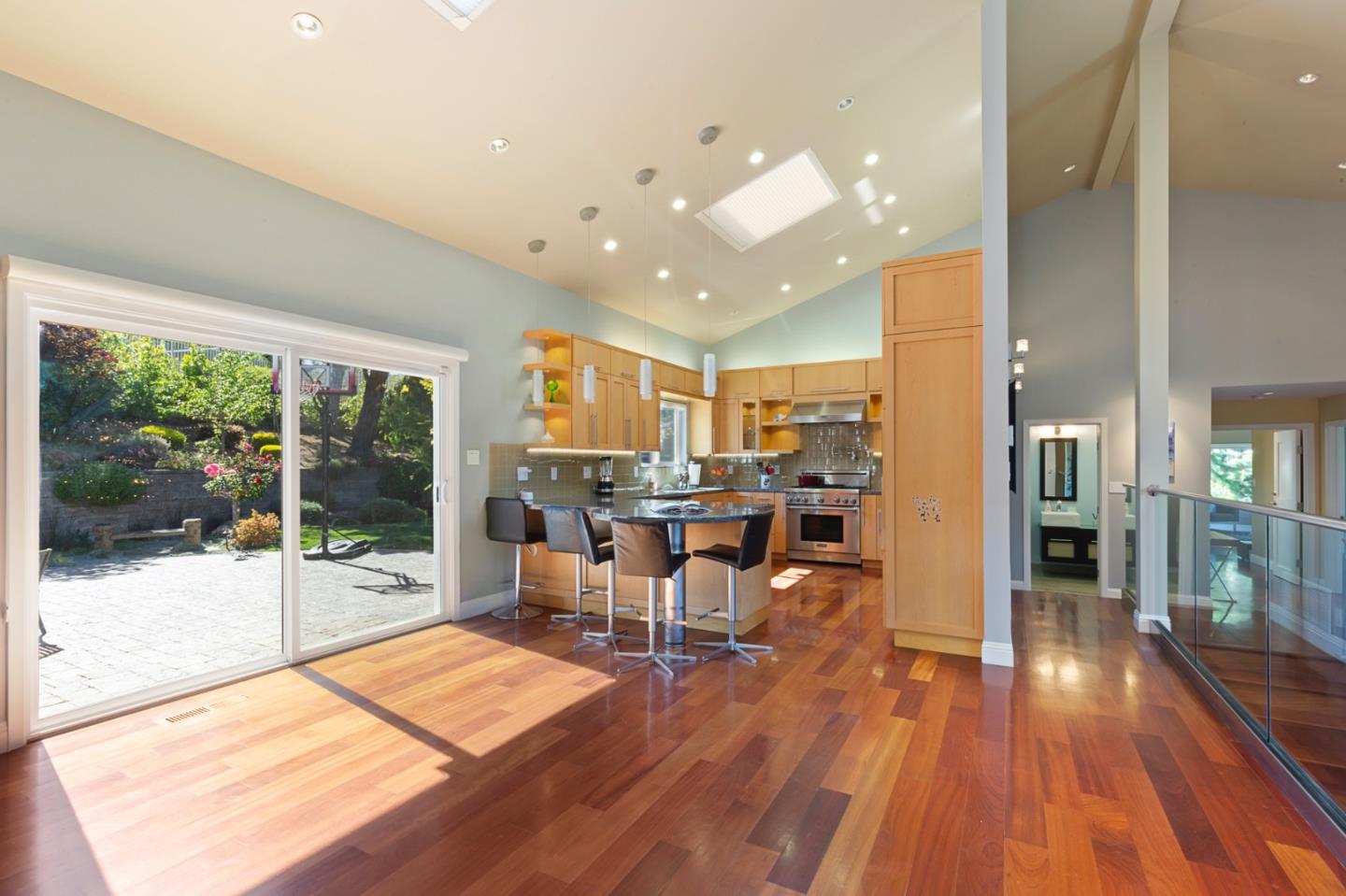 36 Tobin Clark Drive Hillsborough, CA 94010 - Photo 25 of 50 a living room with lots of furniture wooden floor and large windows