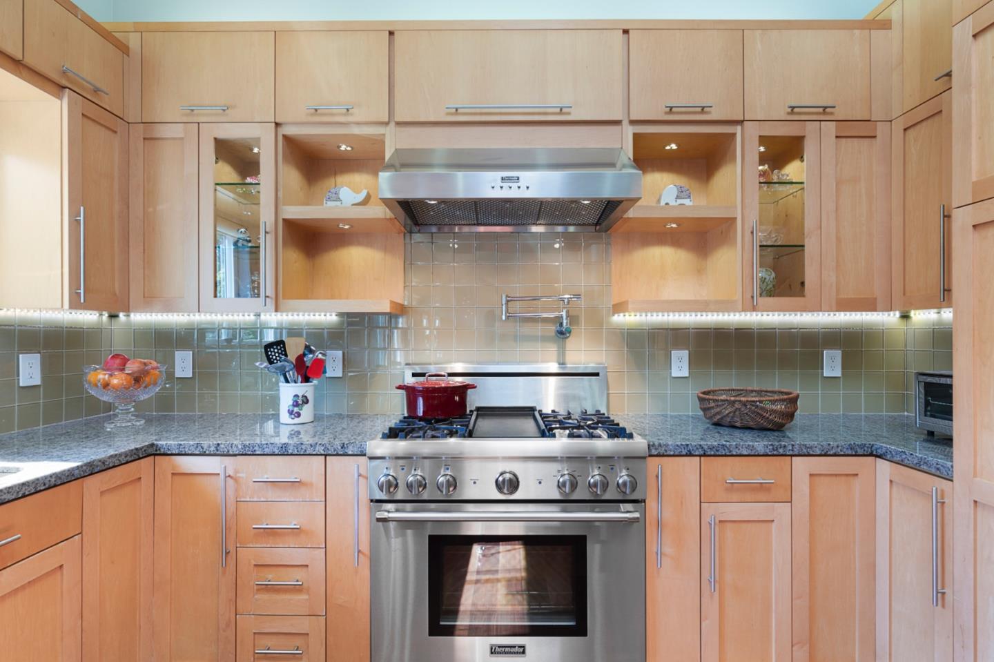 36 Tobin Clark Drive Hillsborough, CA 94010 - Photo 28 of 50 a kitchen with stainless steel appliances granite countertop a stove and cabinets
