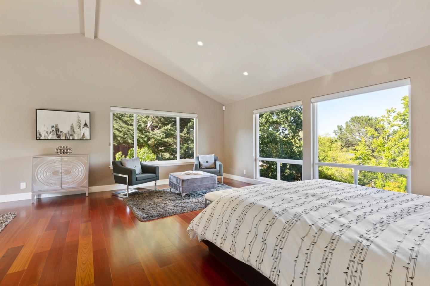 36 Tobin Clark Drive Hillsborough, CA 94010 - Photo 31 of 50 a spacious bedroom with a large bed and a large window