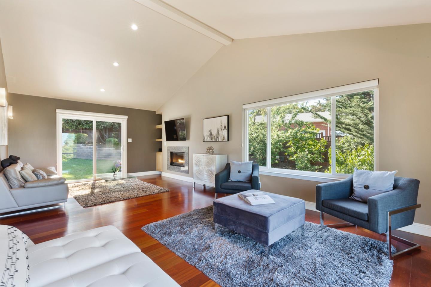 36 Tobin Clark Drive Hillsborough, CA 94010 - Photo 32 of 50 a living room with furniture and a large window