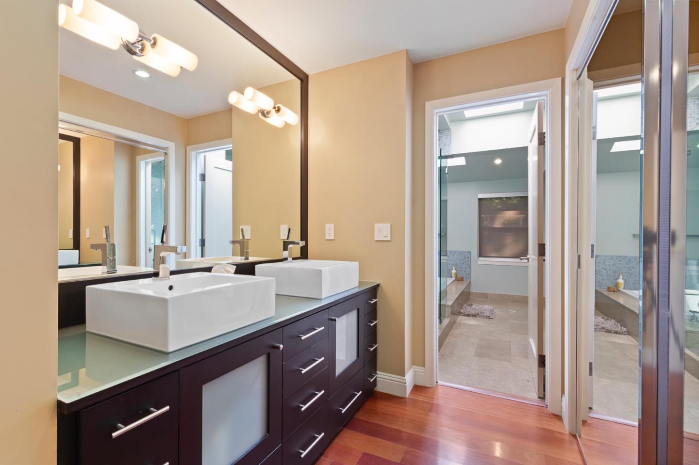 36 Tobin Clark Drive Hillsborough, CA 94010 - Photo 34 of 50 a bathroom with a sink double vanity and a mirror