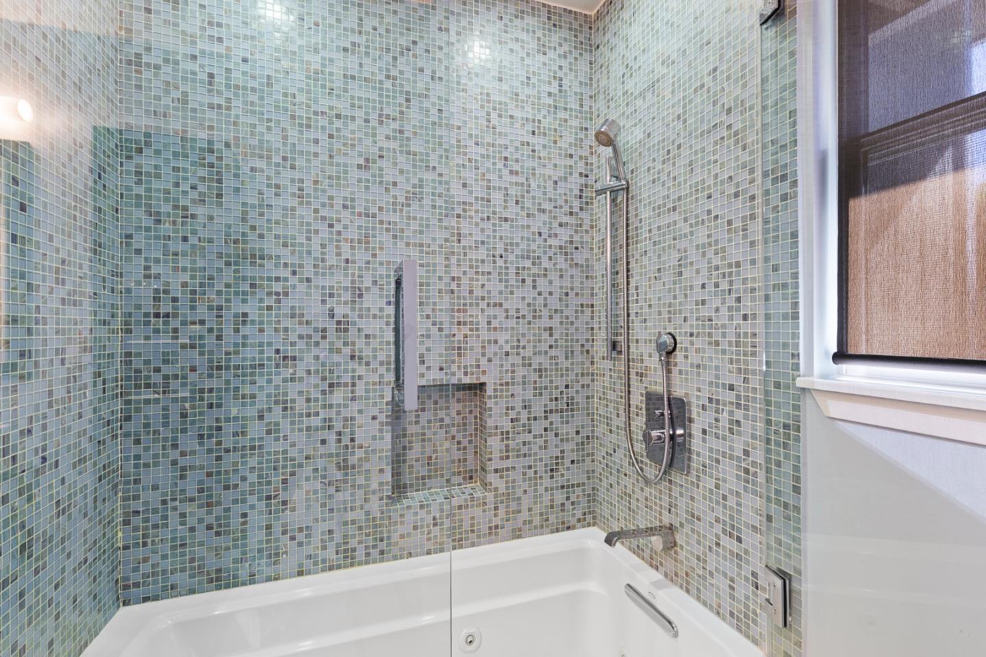 36 Tobin Clark Drive Hillsborough, CA 94010 - Photo 42 of 50 a bathroom with a bathtub and shower