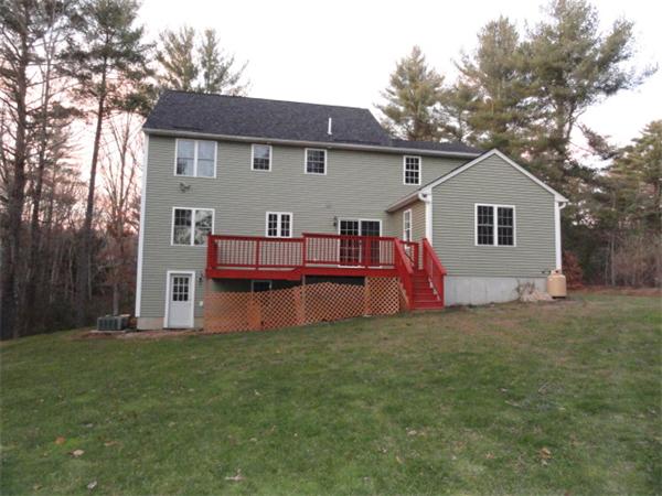 9 Vinton Road Sturbridge, MA 01566 - Photo 12 of 12 a view of a house with a yard and sitting area