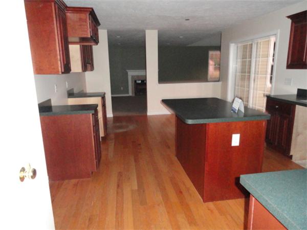 9 Vinton Road Sturbridge, MA 01566 - Photo 6 of 12 a kitchen with granite countertop sink and cabinets