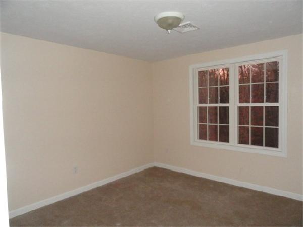9 Vinton Road Sturbridge, MA 01566 - Photo 10 of 12 an empty room with a window