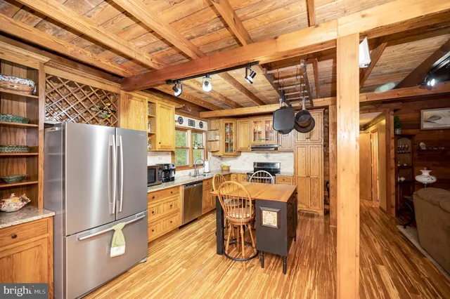 a kitchen with refrigerator and countertop
