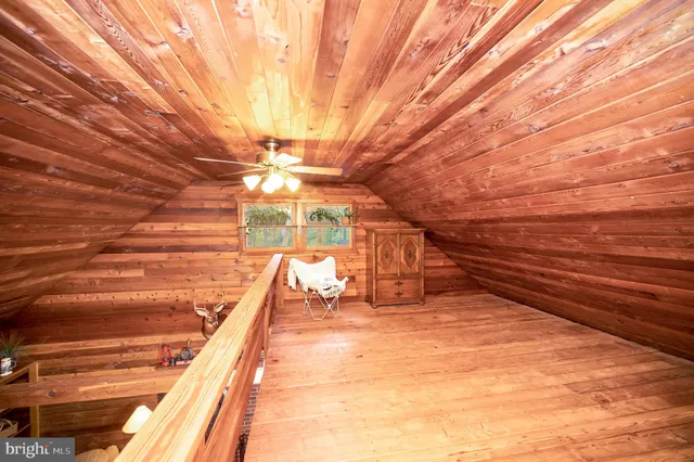 a bathroom with a sink a toilet and shower curtain