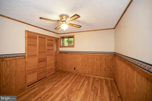 a view of a wooden deck with a bench