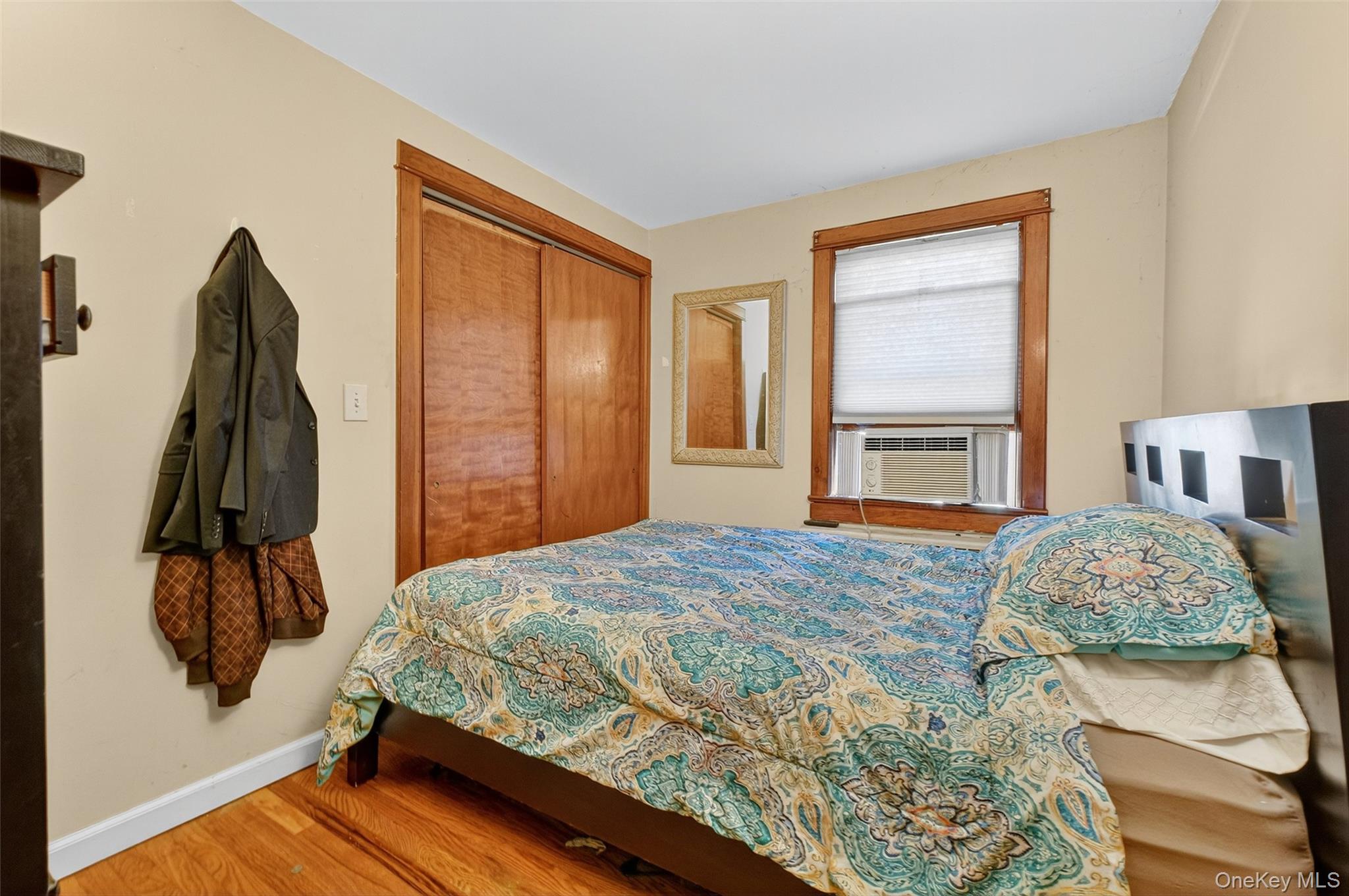 17 Fishkill Hook Road Hopewell Junction, NY 12533 - Photo 20 of 29 a bedroom with a bed and a flat tv screen on dresser