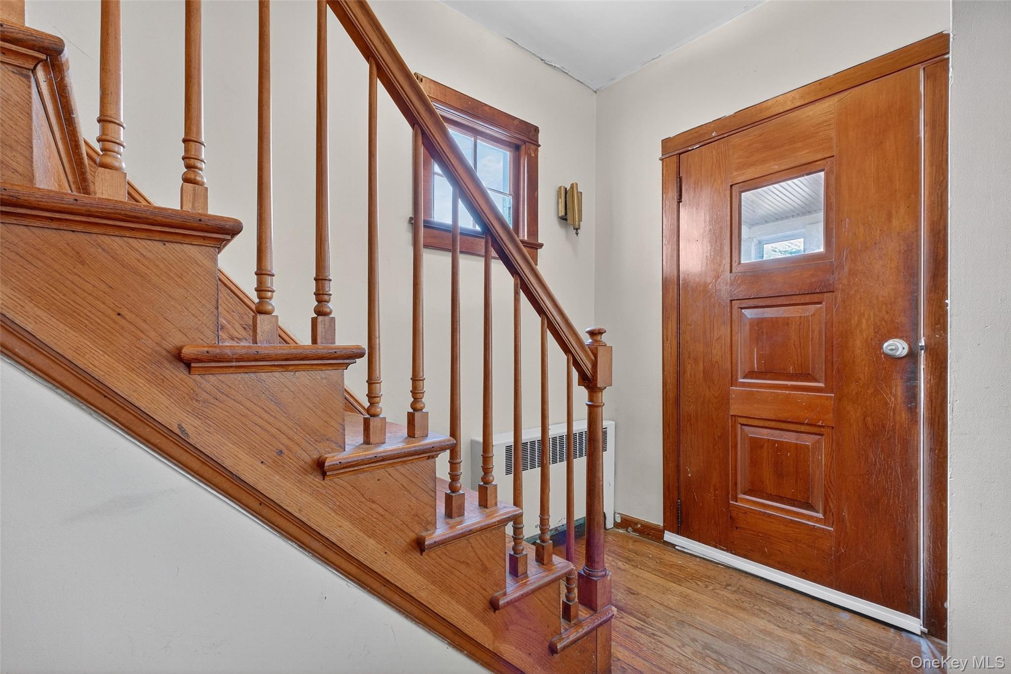 17 Fishkill Hook Road Hopewell Junction, NY 12533 - Photo 4 of 29 a view of staircase with wooden floor and furniture