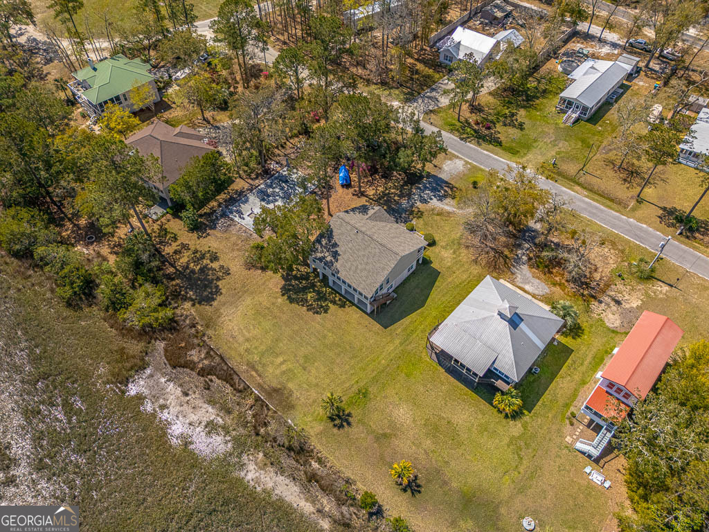 1056 Fiddler Trace Townsend, GA 31331 - Photo 31 of 36 an aerial view of residential houses with outdoor space
