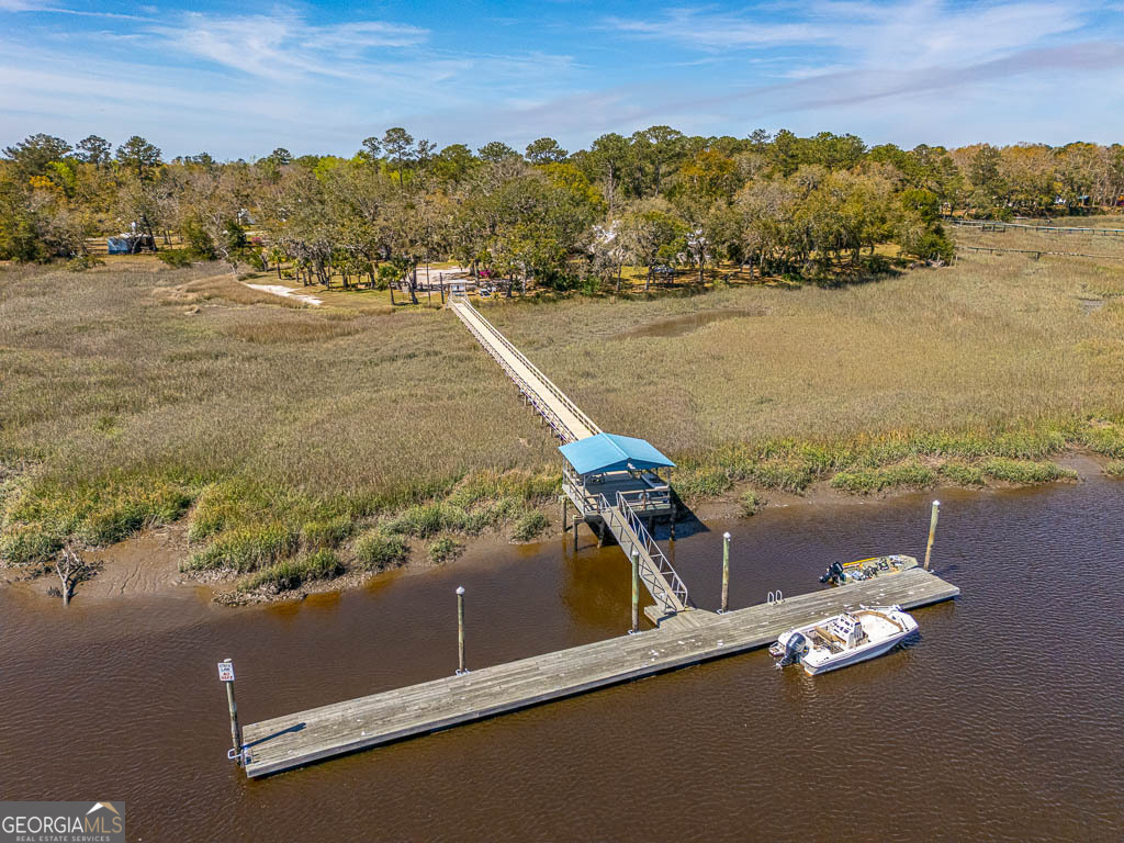 1056 Fiddler Trace Townsend, GA 31331 - Photo 34 of 36 a view of an ocean and beach