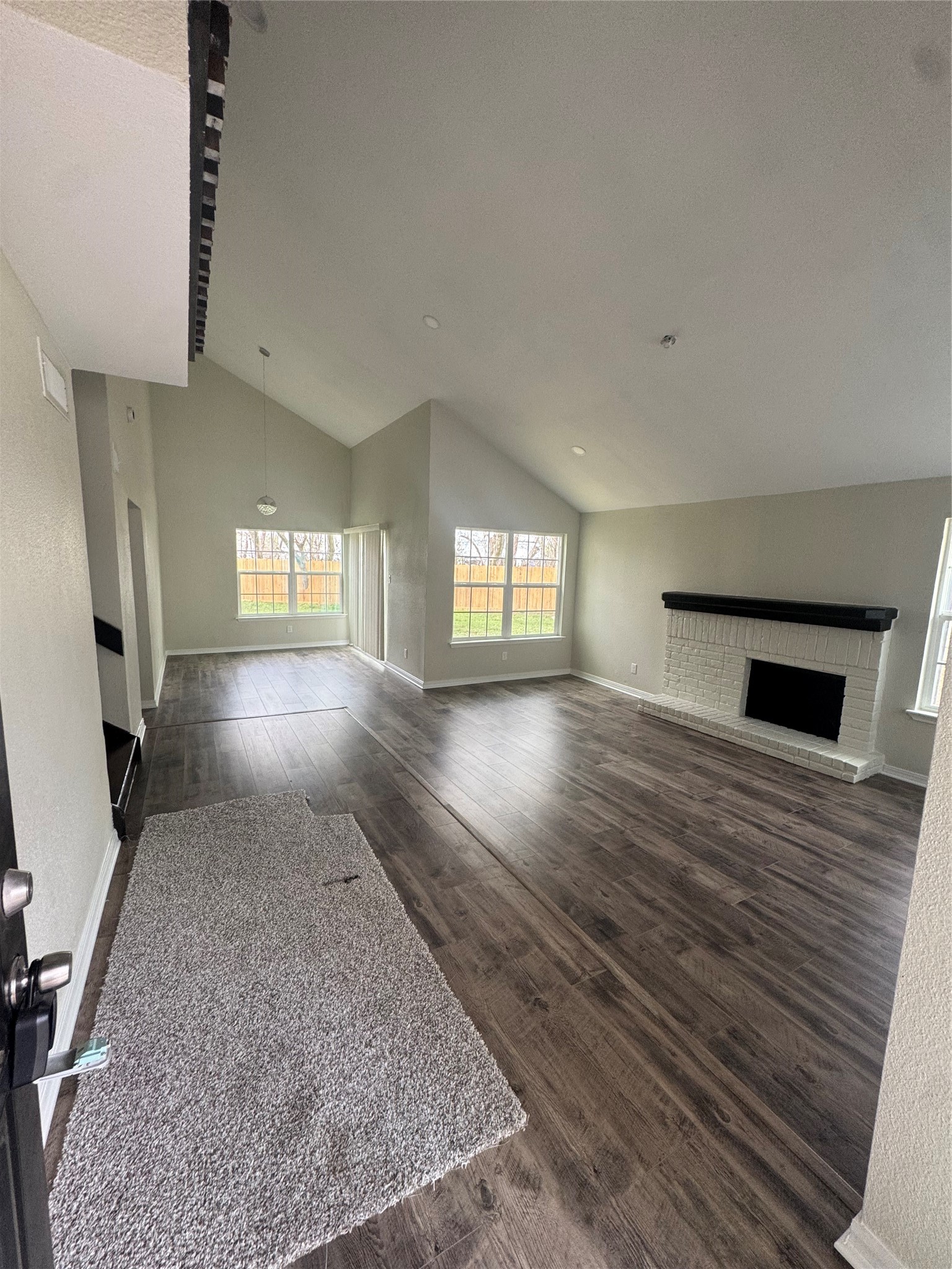 13626 Sunswept Way Houston, TX 77082 - Photo 6 of 30 Living room with high ceiling and lots of natural light