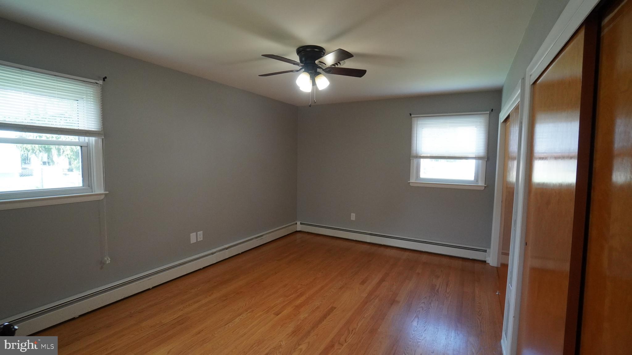 367 Devonshire Road Hagerstown, MD 21740 - Photo 20 of 35 a view of empty room with wooden floor and fan