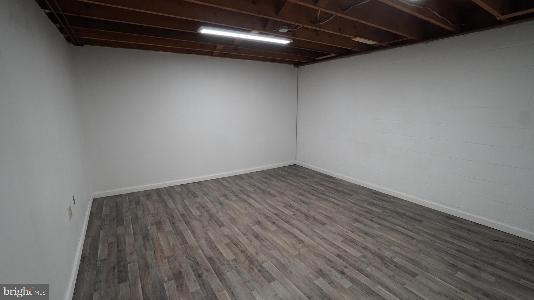 367 Devonshire Road Hagerstown, MD 21740 - Photo 23 of 35 a view of a room with wooden floor and a ceiling fan