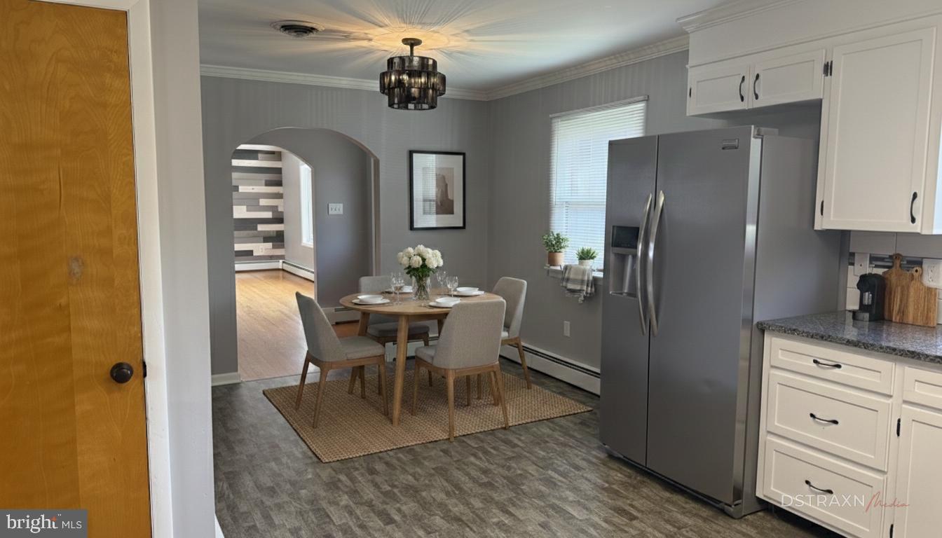367 Devonshire Road Hagerstown, MD 21740 - Photo 3 of 35 a view of a dining room with furniture and chandelier