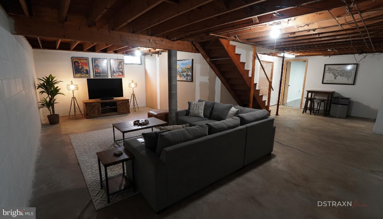 367 Devonshire Road Hagerstown, MD 21740 - Photo 6 of 35 a living room with furniture and a flat screen tv
