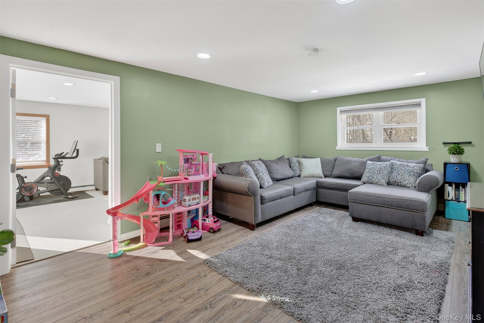 95 Sutton Park Road Poughkeepsie, NY 12603 - Photo 13 of 26 a living room with furniture and a wooden floor