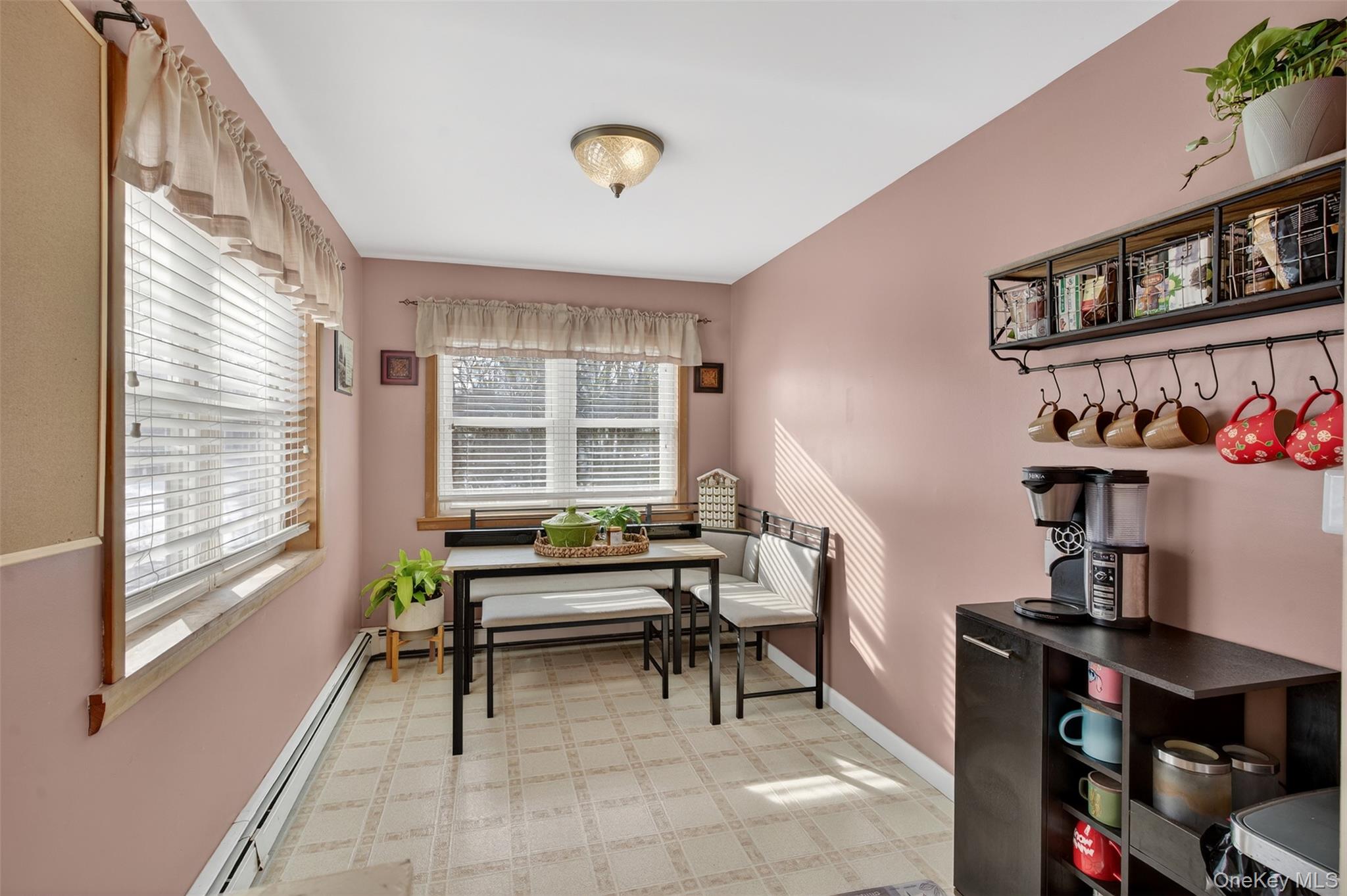 95 Sutton Park Road Poughkeepsie, NY 12603 - Photo 17 of 26 a view of a workspace with furniture and a window