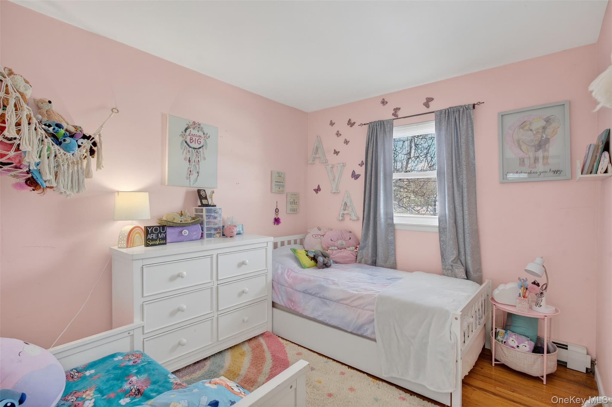 95 Sutton Park Road Poughkeepsie, NY 12603 - Photo 20 of 26 a bedroom with a bed and a window