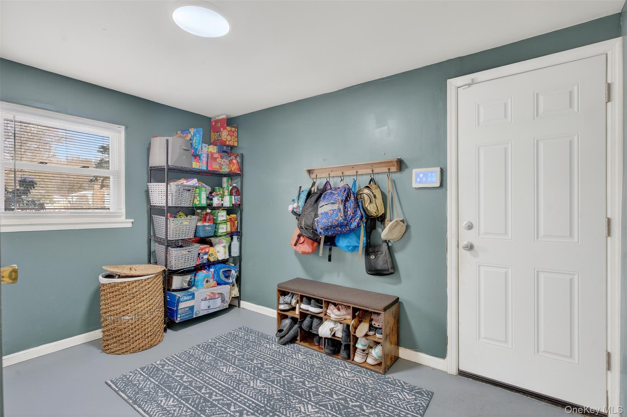 95 Sutton Park Road Poughkeepsie, NY 12603 - Photo 22 of 26 a bedroom with furniture and painting on the wall