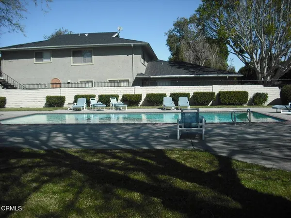a view of house with outdoor space