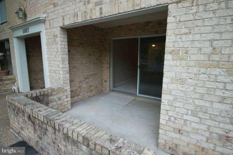 5807 Cove Landing Road, Unit 204 Burke, VA 22015 - Photo 11 of 17 a view of entryway with a wooden door
