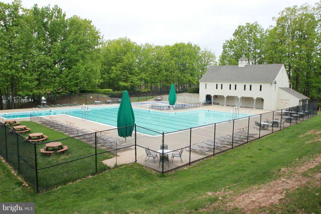 5807 Cove Landing Road, Unit 204 Burke, VA 22015 - Photo 13 of 17 a view of a house with backyard