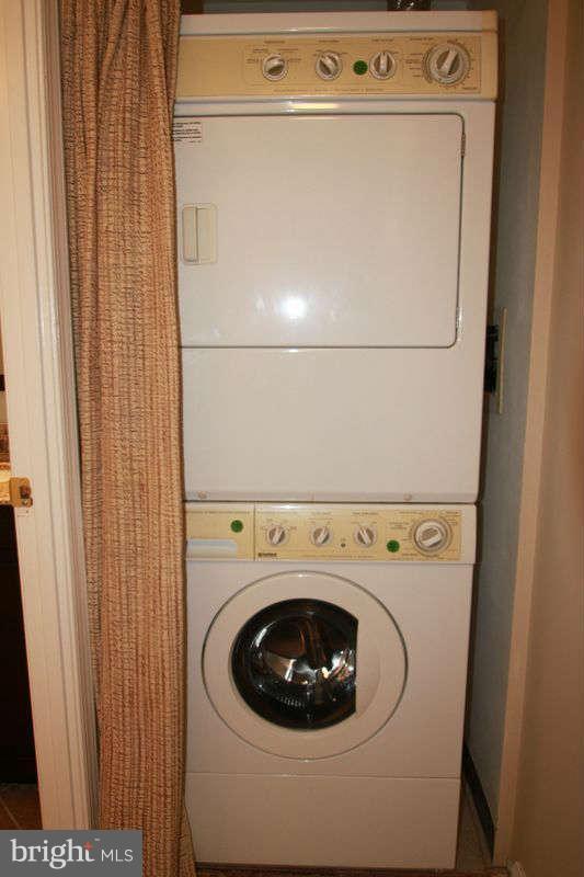 5807 Cove Landing Road, Unit 204 Burke, VA 22015 - Photo 9 of 17 a utility room with dryer and washer