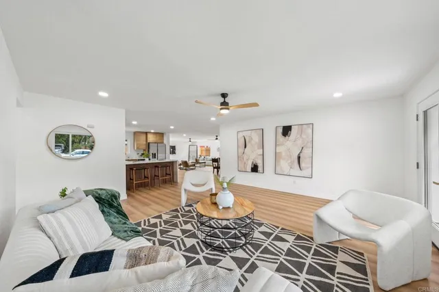 a living room with furniture and a rug