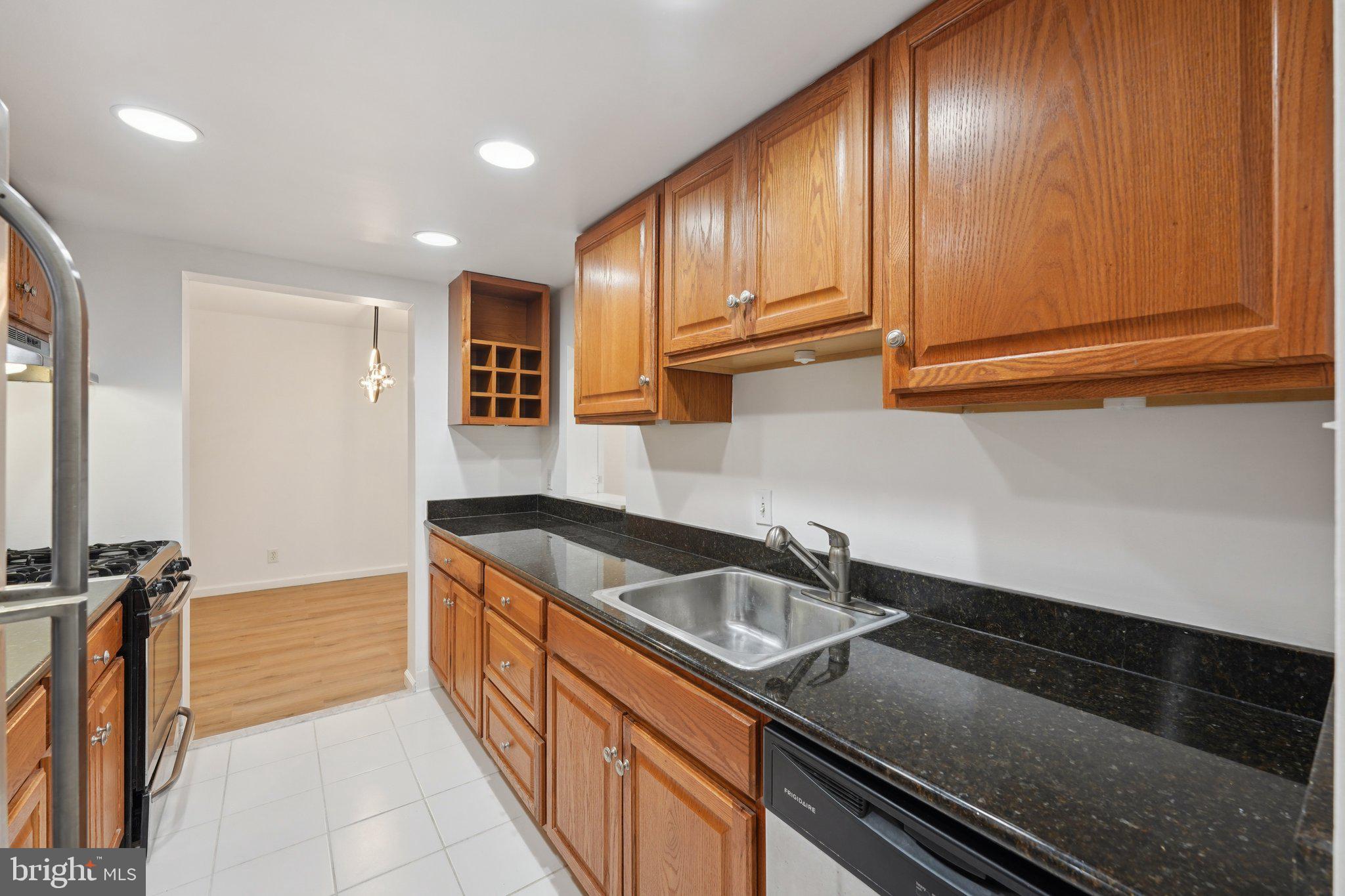 272 Drummers Lane Wayne, PA 19087 - Photo 12 of 46 a kitchen that has a sink and cabinets