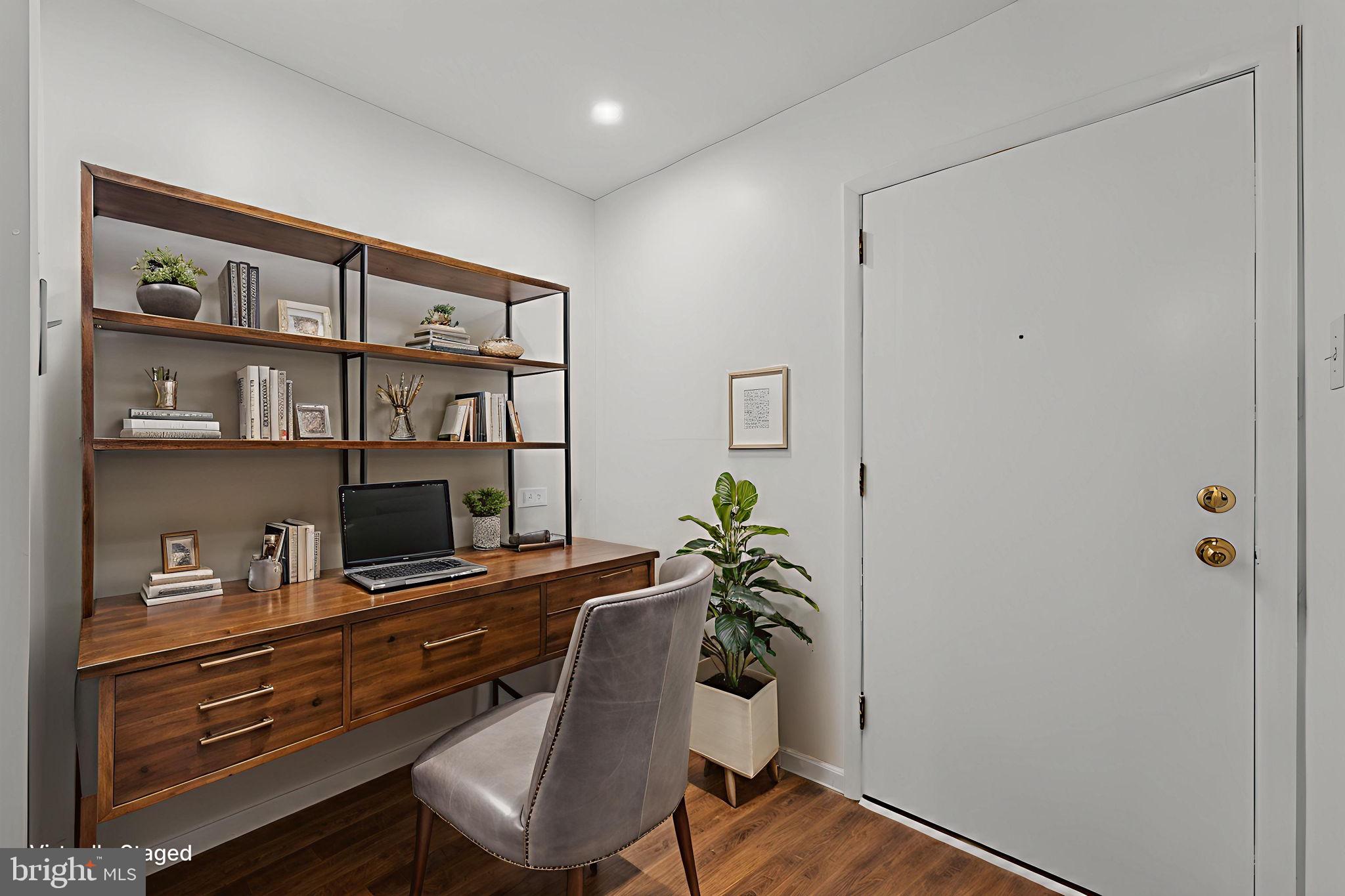 272 Drummers Lane Wayne, PA 19087 - Photo 16 of 46 a workspace with furniture and wooden floor