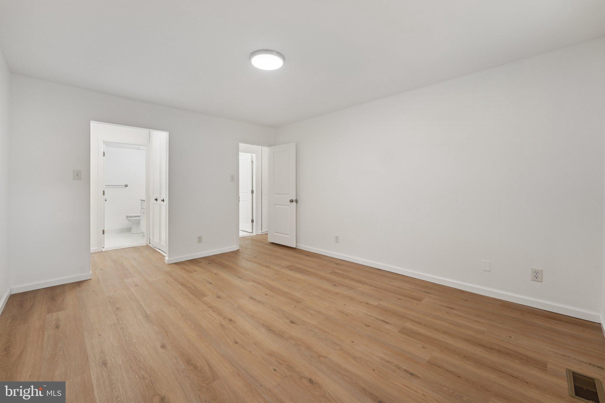 272 Drummers Lane Wayne, PA 19087 - Photo 19 of 46 a view of an empty room and wooden floor