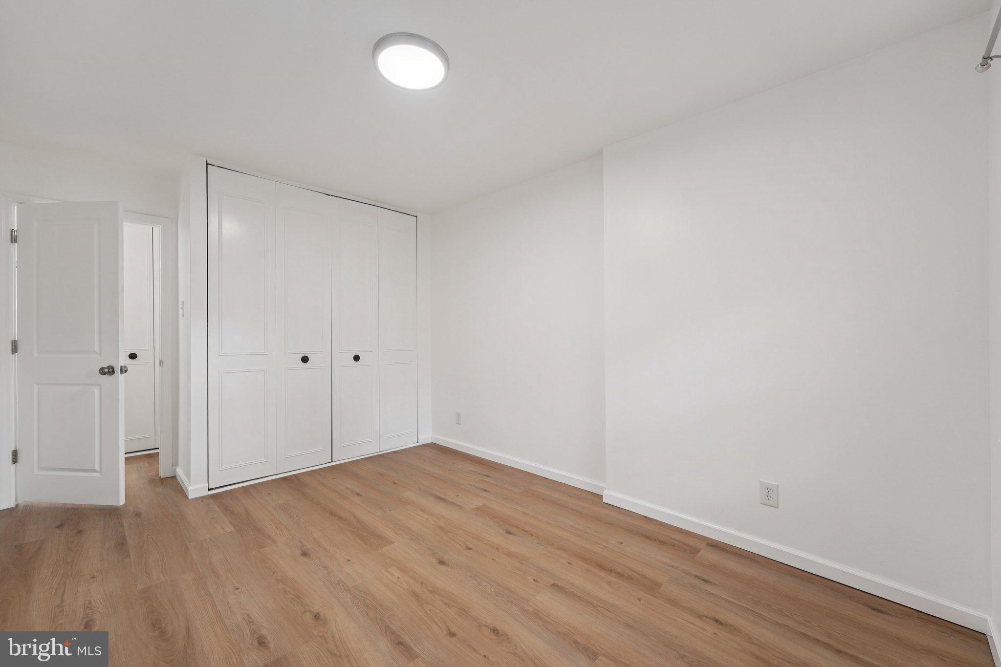 272 Drummers Lane Wayne, PA 19087 - Photo 23 of 46 a view of an empty room with wooden floor