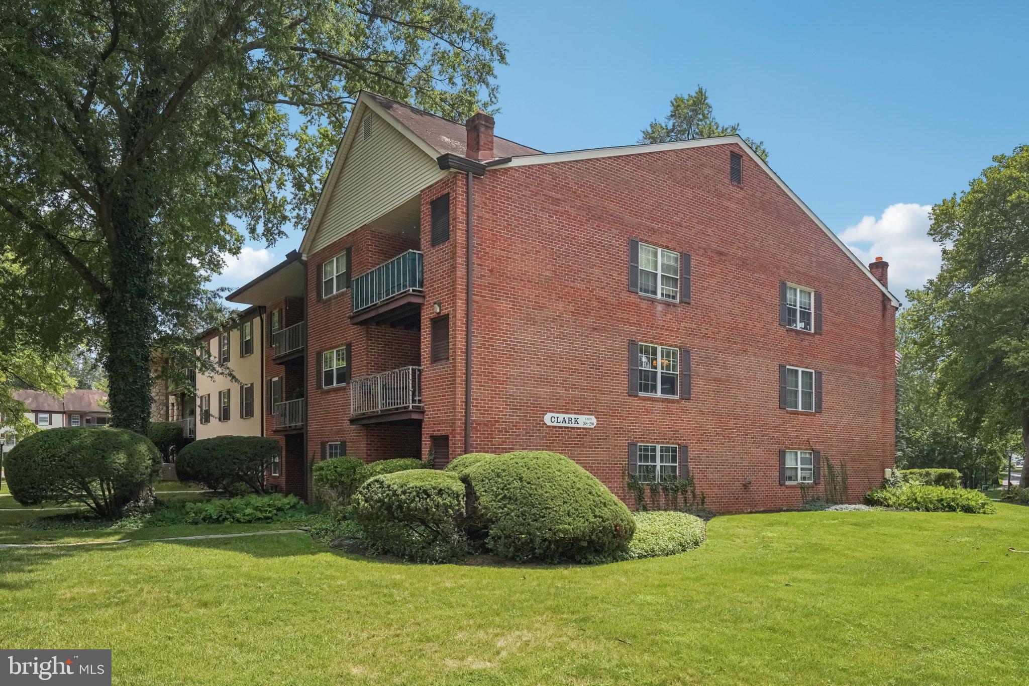272 Drummers Lane Wayne, PA 19087 - Photo 26 of 46 a view of a building with a yard