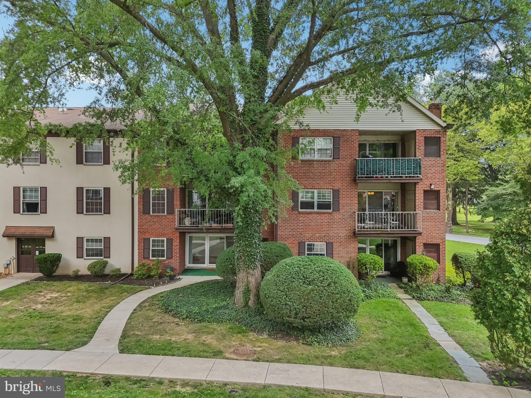 272 Drummers Lane Wayne, PA 19087 - Photo 28 of 46 a front view of a house with a yard