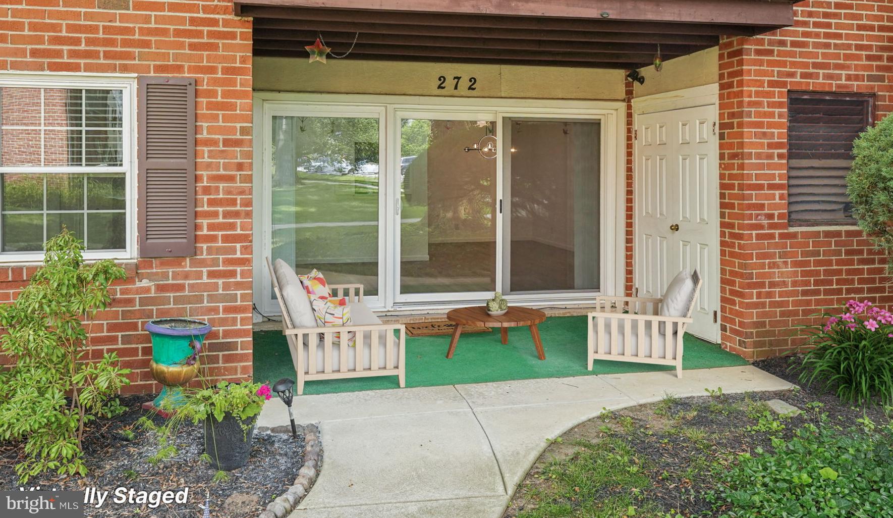 272 Drummers Lane Wayne, PA 19087 - Photo 31 of 46 a front view of a house with a garden