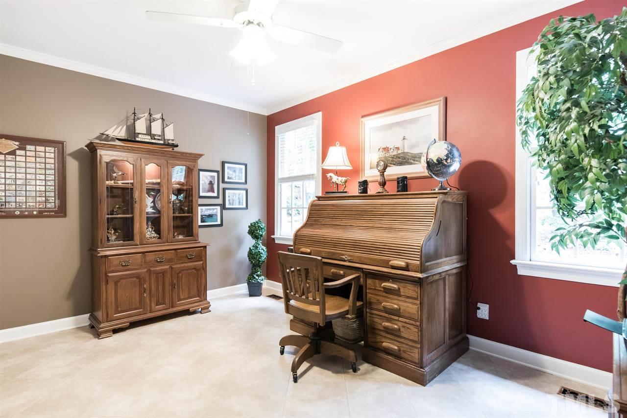 7010 Spring Ridge Road Cary, NC 27518 - Photo 10 of 25 Currently used as an office, this room has an oversized closet in a quiet corner of the first floor.