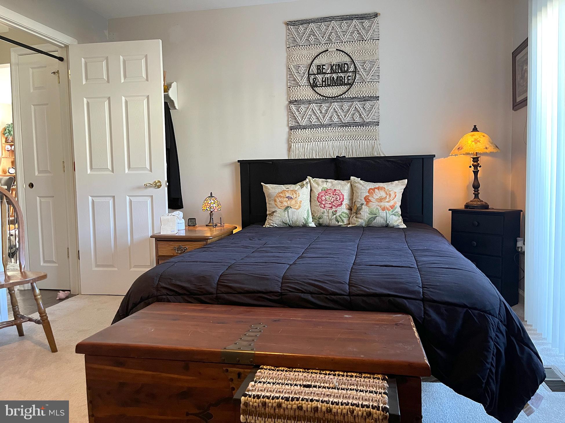 40 Tansboro Road, Unit 3A Berlin, NJ 08009 - Photo 11 of 19 a bedroom with a bed and wooden floor