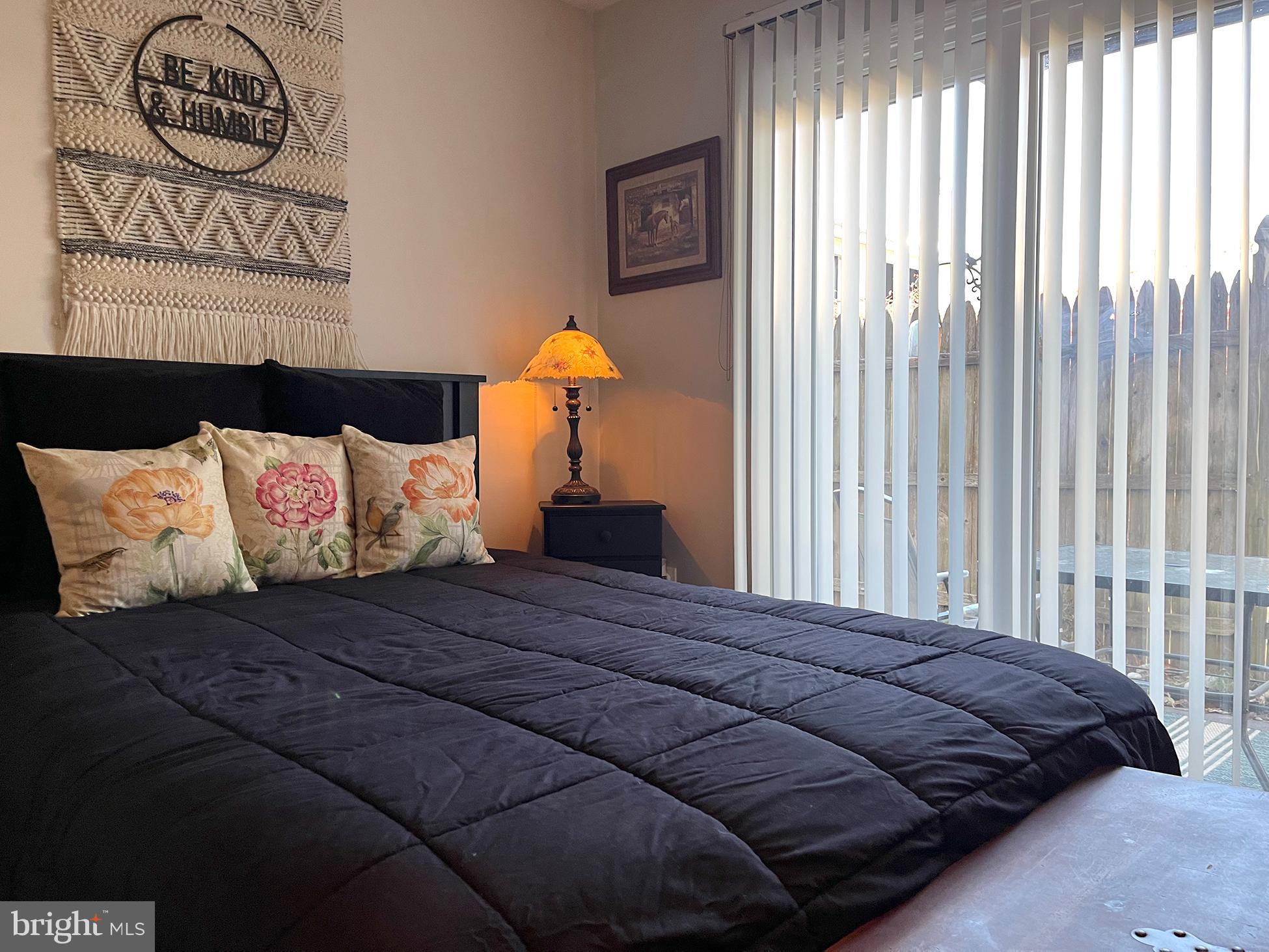 40 Tansboro Road, Unit 3A Berlin, NJ 08009 - Photo 12 of 19 a bedroom with a bed and a painting on the wall