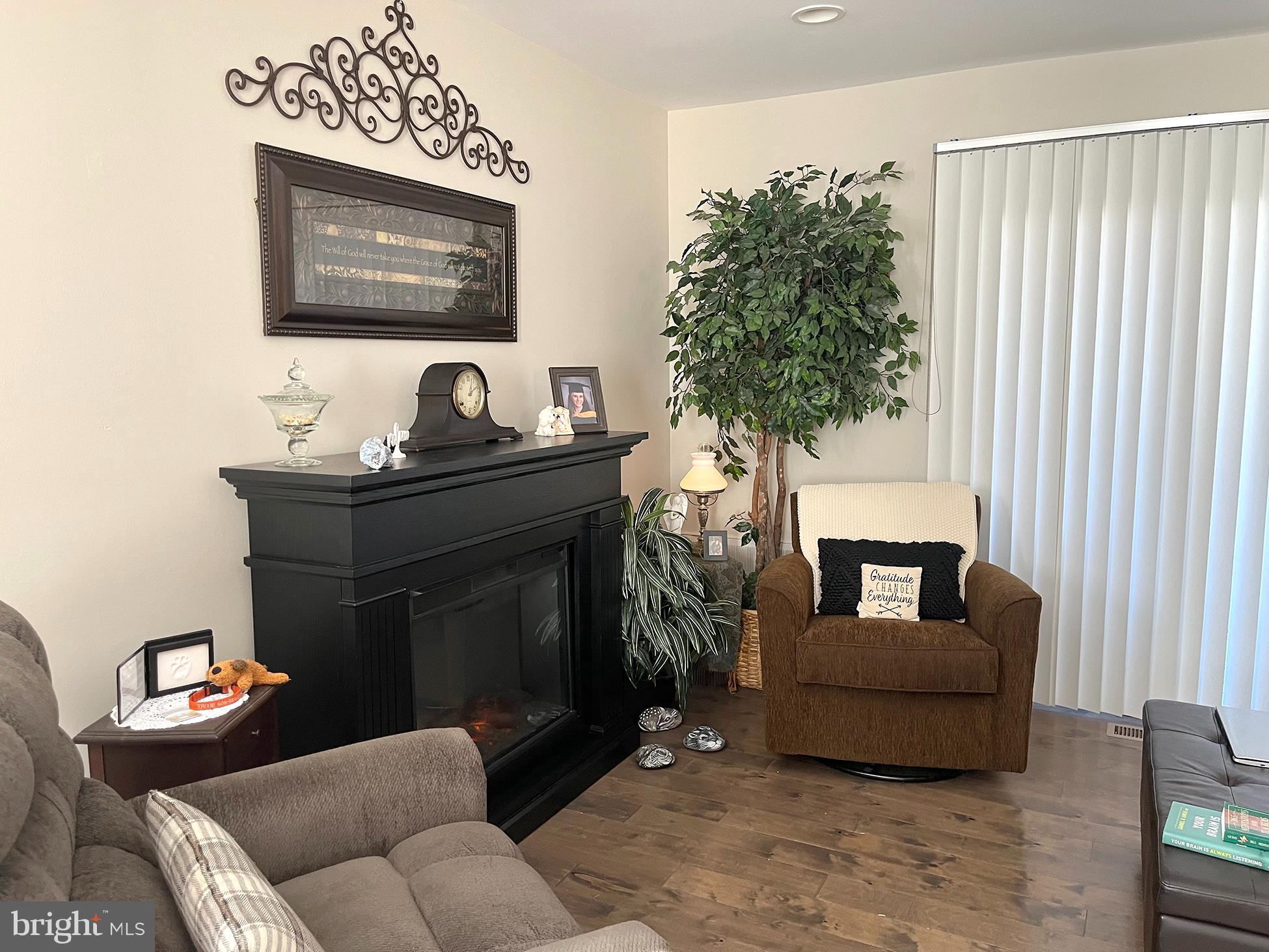 40 Tansboro Road, Unit 3A Berlin, NJ 08009 - Photo 13 of 19 a living room with furniture and a fireplace