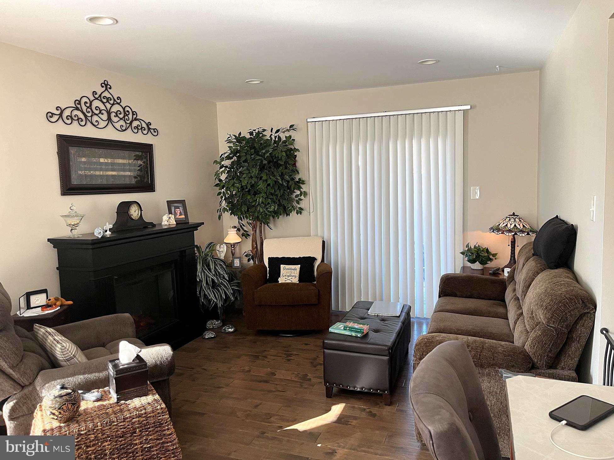 40 Tansboro Road, Unit 3A Berlin, NJ 08009 - Photo 14 of 19 a living room with furniture and a flat screen tv