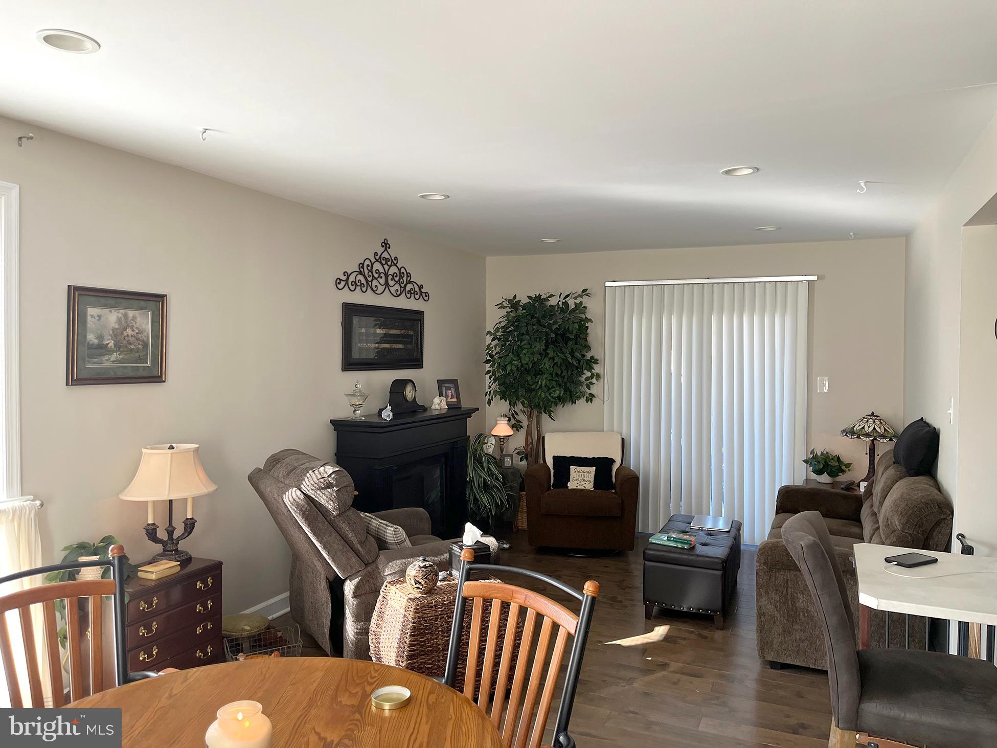 40 Tansboro Road, Unit 3A Berlin, NJ 08009 - Photo 3 of 19 a living room with furniture wooden floor and a window