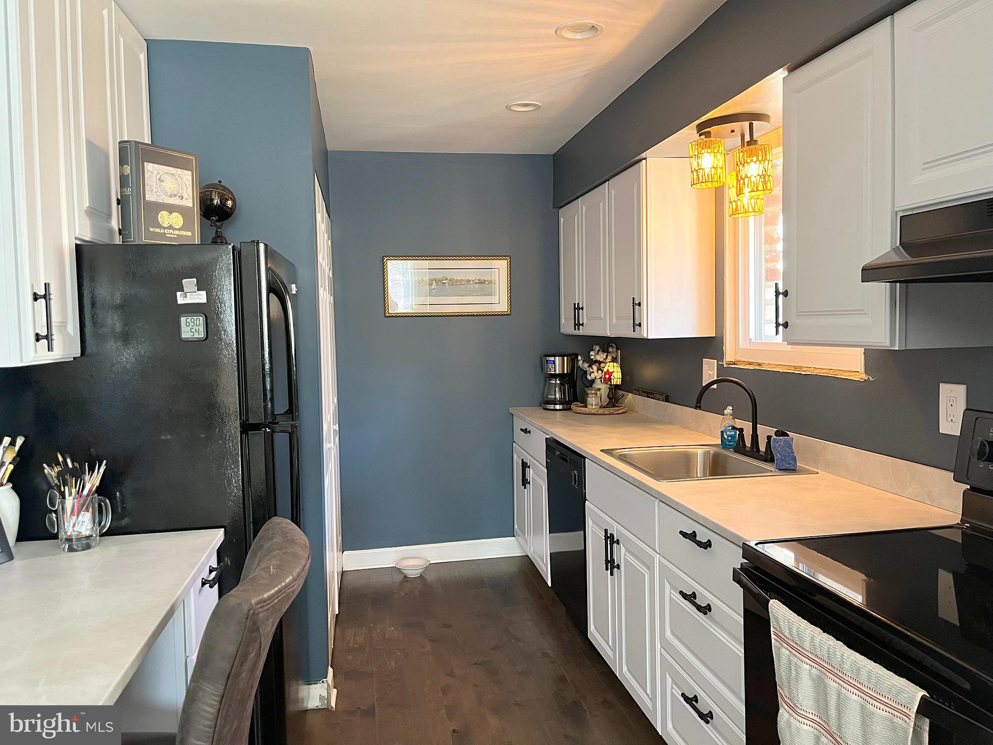 40 Tansboro Road, Unit 3A Berlin, NJ 08009 - Photo 6 of 19 a kitchen with a sink stove and refrigerator