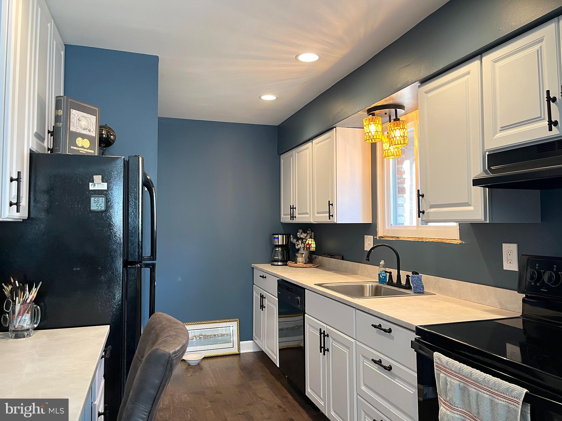 40 Tansboro Road, Unit 3A Berlin, NJ 08009 - Photo 7 of 19 a kitchen with a sink a window and cabinets